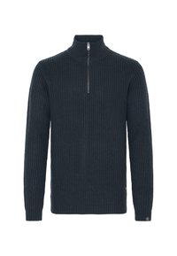 Dark blue knitted sweater with a high collar and a short zipper. Features ribbed texture and long sleeves. Small logo on the sleeve.