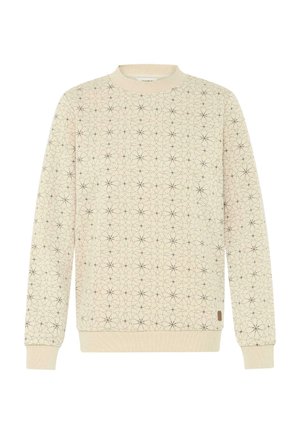 Sweatshirt beige clair avec un motif géométrique noir et rouge complexe. Col et poignets côtelés, avec une petite étiquette de marque sur l'ourlet.