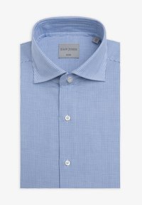 Blåternet skjorte med slank pasform, der har en struktureret krave, knaplukning og blød stoftekstur. Mærket hedder "DAN JOHN."