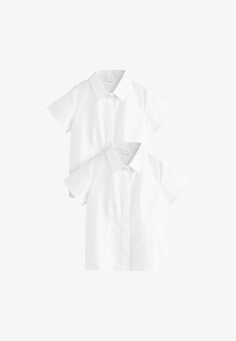 Two plain white short-sleeve collared shirts with buttoned fronts, displayed overlapping on a white background.