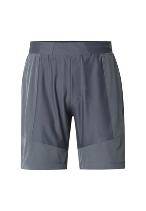 Sötétszürke sportnadrág világosabb szürke panelekkel az oldalakon és az alján, elasztikus derékpánttal és látható első varrásvonalakkal.