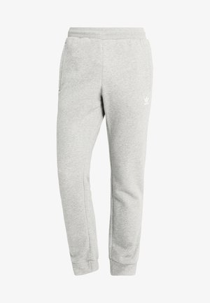 Hellgraue Adidas Sweatpants mit elastischem Bund, Seitentaschen und gerippten Fußbündchen, mit kleinem weißem Logo am Oberschenkel.