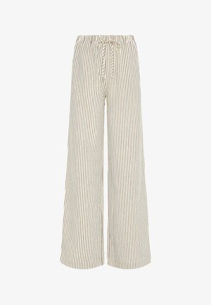 Beżowe spodnie o szerokich nogawkach z cienkimi pionowymi czarnymi paskami oraz elastycznym pasem z wiązaniem z przodu.