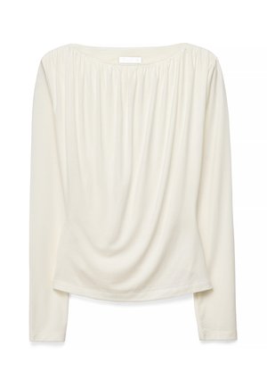 Blusa a maniche lunghe color crema con scollo arricciato e morbida caduta sul davanti, realizzata in tessuto leggero.