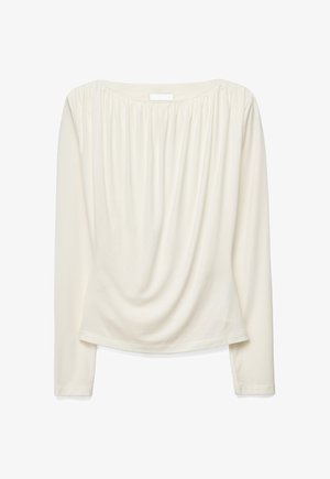 Blusa a maniche lunghe color crema con scollo arricciato e morbida caduta sul davanti, realizzata in tessuto leggero.