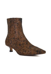 Brown faux-fur ankle boot with a pointed toe and small kitten heel, featuring a speckled pattern and smooth black sole.