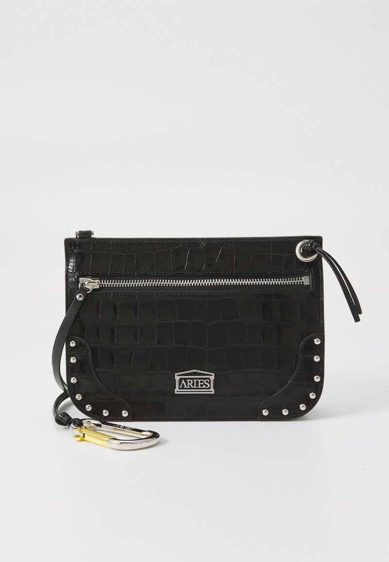 Black crocodile-embossed faux leather bag with a zip closure, silver hardware, studded accents, and a detachable strap with a clasp.