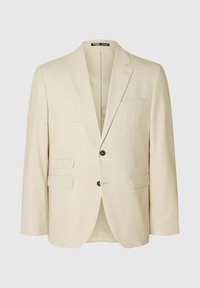 Jasno beżowy żakiet wykonany z fakturowanej tkaniny, z pojedynczym zapięciem, dwoma przednimi kieszeniami i dwoma czarnymi guzikami.