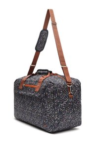 Musterhafte Reisetasche aus Stoff mit dunklem Grundton, versehen mit winzigen Blumendesigns, braunen Trägern und einer Reißverschlusstasche.