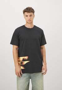 adidas Performance TRAE TEE - Marškinėliai su spaudiniu - black