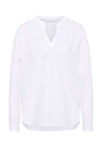 Haut blanc à manches longues avec un col en V, fabriqué en tissu lisse. Présente un ourlet arrondi et une texture douce, adapté à une tenue décontractée.