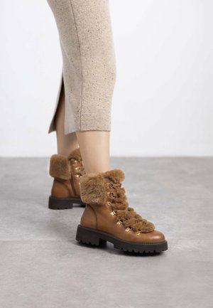 Botas para la nieve - camel
