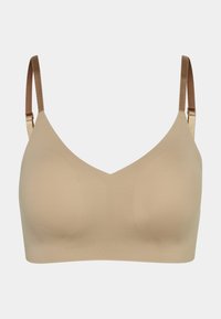 Beige bra with a smooth, seamless design, soft fabric, and adjustable satin straps. Features a classic V-neck shape for comfort.