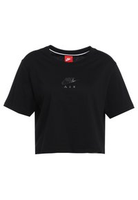Černé croptop tričko vyrobené z bavlny. Má kulatý výstřih, krátké rukávy a centrální logo Nike s nápisem "AIR" ve stylizovaném písmu.