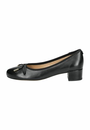Ballerines en cuir noir avec un bout arrondi, présentant un nœud décoratif et des détails en métal doré, ainsi qu'un petit talon carré.