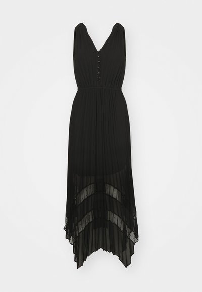 Svart plissédress med V-hals, uten ermer, og knappedetaljer. Har en lagdelt, gjennomsiktig hemline med en flytende tekstur.