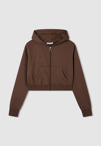 Felpa corta marrone con zip, tasche frontali, tirazip a cerchio, polsini e orlo a costine, posata su uno sfondo chiaro.