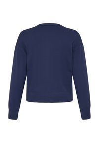 Tamsiai mėlynas megztinis laisvo silueto, su ilgomis rankovėmis, apvalia iškirpte ir gumbus apdaila apačioje bei rankogaliuose. Lygios tekstūros.