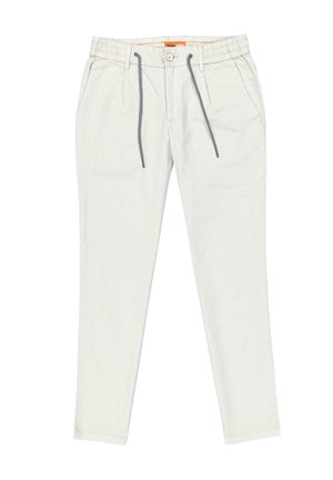 Helle graue Baumwollhose mit elastischem Bund, Kordelzug und Vorderentaschen. Glatte Textur, schmaler Schnitt, flaches Design.