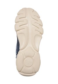 Semelle d'une chaussure beige avec des motifs d'adhérence texturés et le nom de la marque "Buffalo" embossé dans la zone du talon.