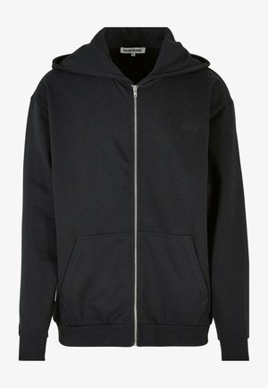 Schwarze Zip-Hoodie aus weichem Stoff. Verfügt über einen Frontreißverschluss, zwei Taschen und eine angenähte Kapuze. Einfaches Design ohne sichtbare Muster.