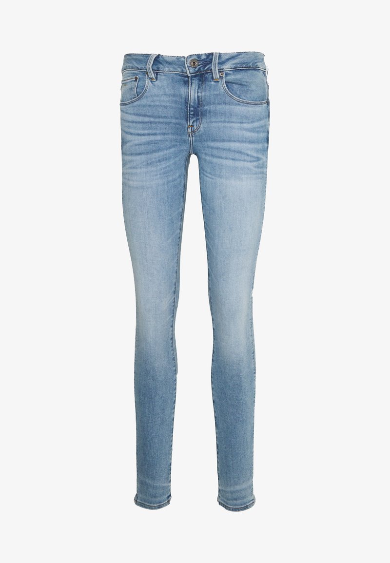 Jean skinny bleu clair en denim avec taille mi-haute, cinq poches, et un léger délavage au niveau des cuisses et des genoux.