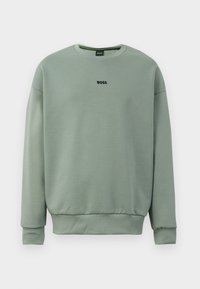 Mint green sweatshirt made of soft fabric featuring a crew neckline, ribbed cuffs, and "BOSS" logo stitched in black on the front.