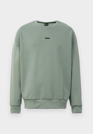 Mint green sweatshirt made of soft fabric featuring a crew neckline, ribbed cuffs, and "BOSS" logo stitched in black on the front.