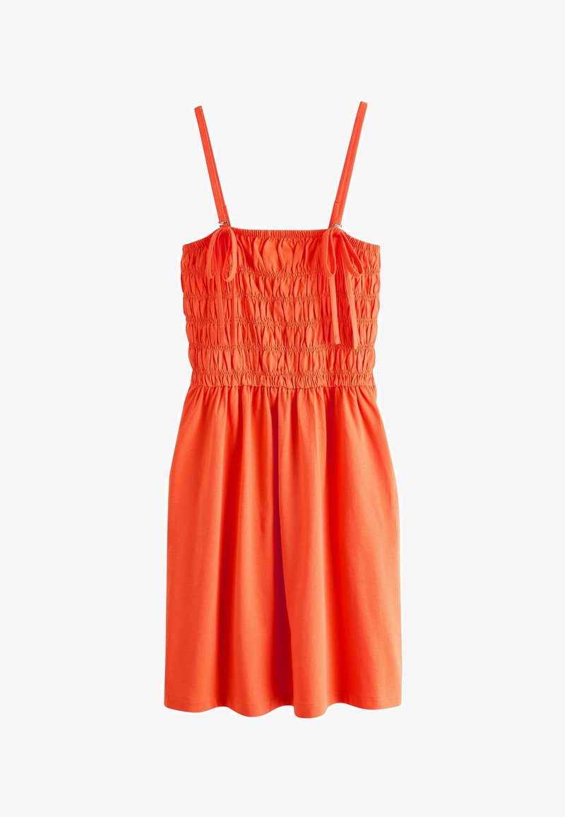 Robe sans manches orange vif avec corsage froncé et bretelles spaghetti réglables nouées en petits nœuds à l'avant.