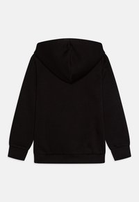 Svart huvtröja med framficka, ribbade muddar och fåll. Tillverkad av mjukt tyg, med en mysig huva och en enkel, sömlös design.