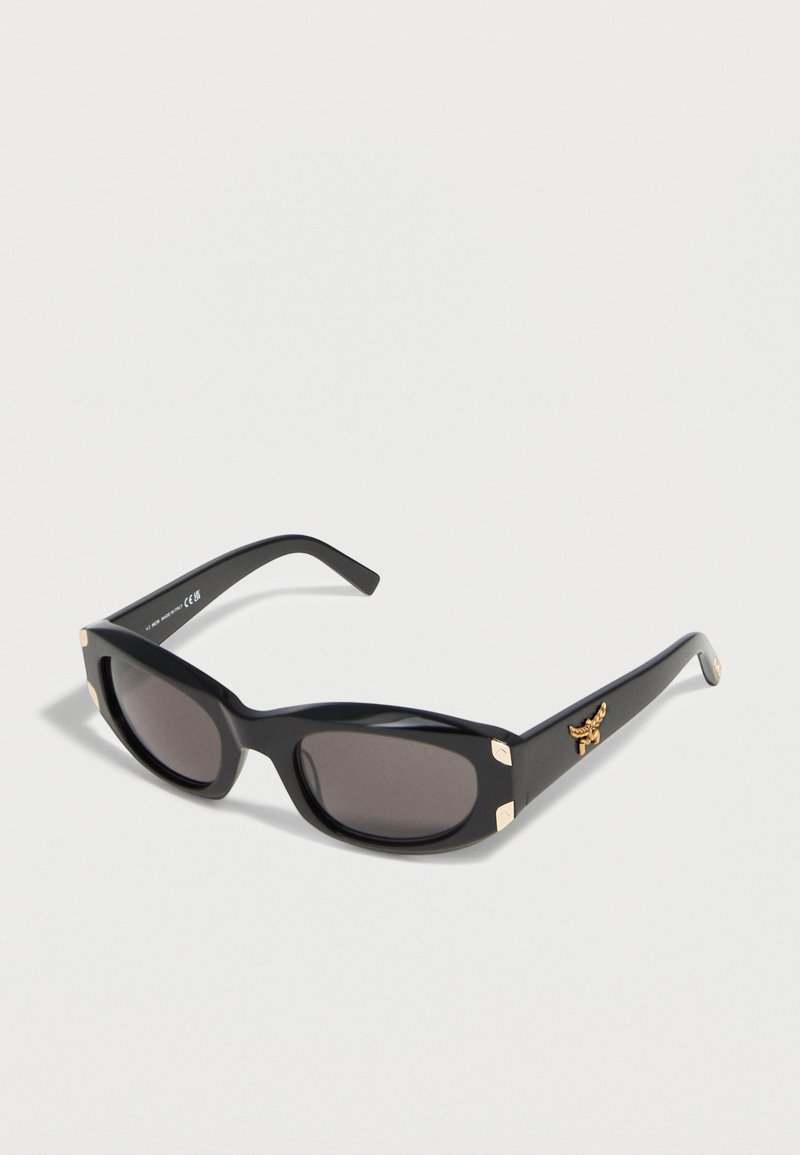 Black rectangular sunglasses with dark lenses and small gold accents on corners and temples, including a gold winged emblem.