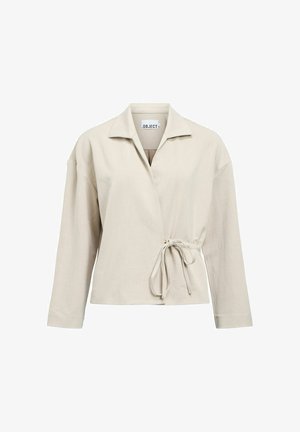 Bēšs iesaiņojams žakete ar garām piedurknēm, apkakli un sānu saites aizdari, izgatavota no viegla auduma.