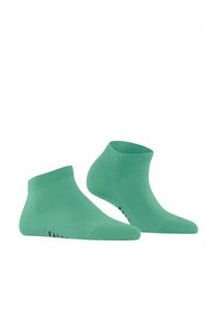 Skarpetki do kostek w kolorze mięty z prążkowanym mankietem, bezszwami na palcach i czarnym nadrukiem po boku. Miękki materiał dla komfortu i elastyczności.