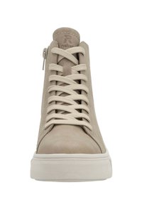 Beige suede high-top sneaker with textured laces, front zipper, round toe, and rubber sole. Subtle branding on the tongue.