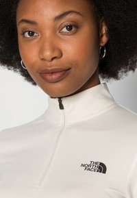 The North Face CROP ZIP THROUGH - Camisola de manga comprida - vintage white