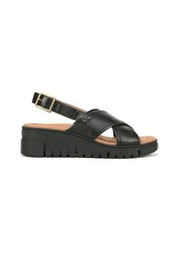 Sandali in pelle nera con design a fascia incrociata, cinturino alla caviglia regolabile con fibbia in metallo, soletta in sughero e suola in gomma nera ribassata.