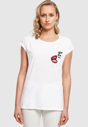 White cotton t-shirt with rolled short sleeves, featuring a graphic of red lips and the text "Bla Bla Bla" on the left chest area.