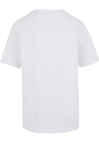 Balts īsām piedurknēm T-krekls, izgatavots no kokvilnas ar mīkstu tekstūru, ar klasisku apaļu kaklu un brīvu piegriezumu. Nav redzamu grafiku.