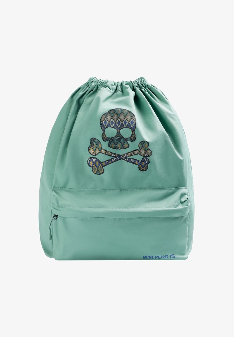 Mint green drawstring backpack made of smooth fabric, featuring an embroidered skull and crossbones design with geometric patterns.