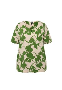 Blusa a maniche corte color beige con grande motivo floreale verde; vestibilità rilassata; tessuto morbido e liscio; presenta un colletto arrotondato.