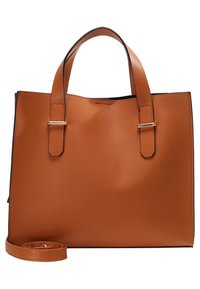 Sac fourre-tout en cuir marron avec double poignées et une bandoulière amovible enroulée à la base, présenté sur un fond blanc.