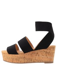 Schwarze Plateau-Sandalen mit Kork-Absatz. Mit breiten Stoffbändern über den Fuß und Knöchel, die einen sicheren Sitz und Komfort bieten.