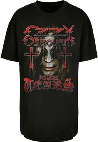 Schwarzes Baumwoll-T-Shirt mit einem Grafiker eines Gesichts mit langen Haaren, roten Akzenten und dem Text "Ozzy Osbourne No More Tears" sowie Kreuzen.