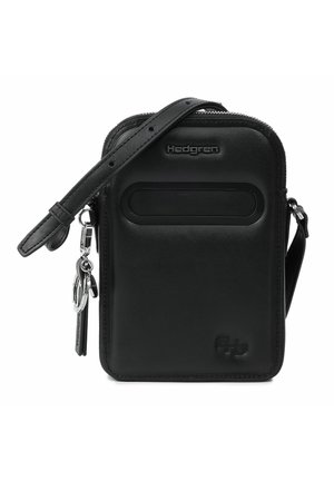 Black leather crossbody bag with adjustable strap, silver keychain, and zipper closure, brand name "Hedgren" on front.