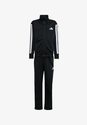 Chándal negro con chaqueta de cremallera y rayas blancas en los hombros, y pantalones a juego; fabricado en una tela suave con un ajuste atlético.