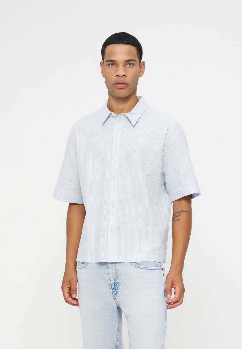 Camisa