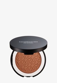 BareMinerals Bronzer in einem runden, schwarzen Kompaktpuder. Das Puder hat einen warmen Tan-Ton mit einem eingravierten Muster. Der Deckel zeigt den Text "bareMinerals" und "ORIGINAL".