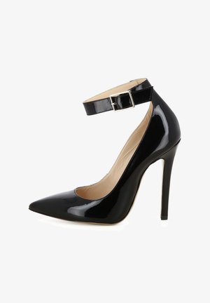 Black patent leather high-heeled pump with pointed toe, ankle strap, and slender stiletto heel. Smooth texture and shiny finish.