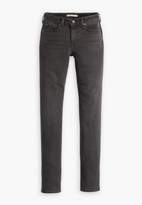 Jeans de denim negro con un diseño ajustado, estilo de cinco bolsillos y lazos para cinturón. La tela es suave con un desgaste mínimo.