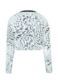 Gekürzter Pullover mit langen Ärmeln aus einem fuzzy weißen Stoff, der ein schwarzes abstraktes Muster aufweist. Runder Ausschnitt, sanfte Textur.